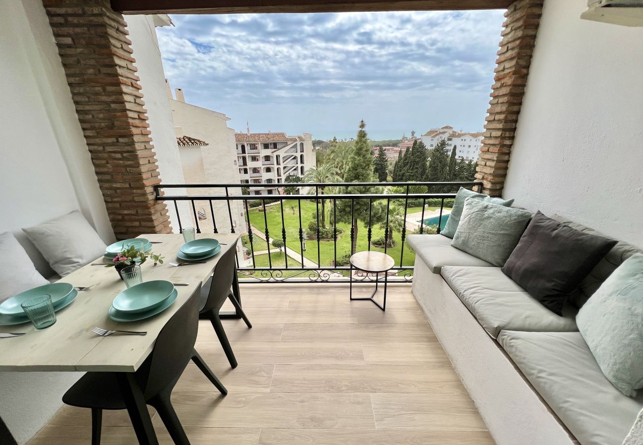 Apartamento en Mijas Costa - (REF 53) Apartamento en Riviera con vista piscina y mar